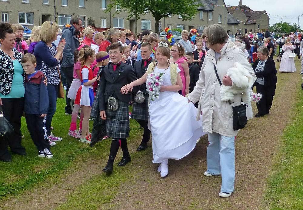 Gala Queen Erin and her court arriving for the Crowning