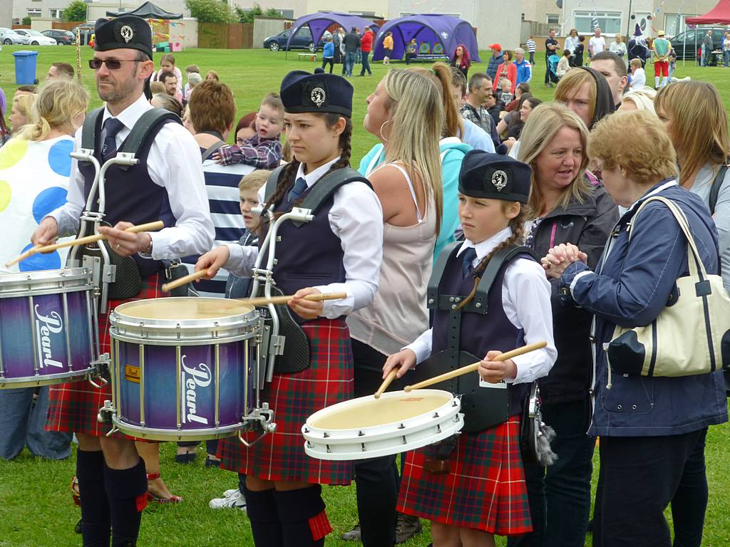 Pigtailed Young Drummers