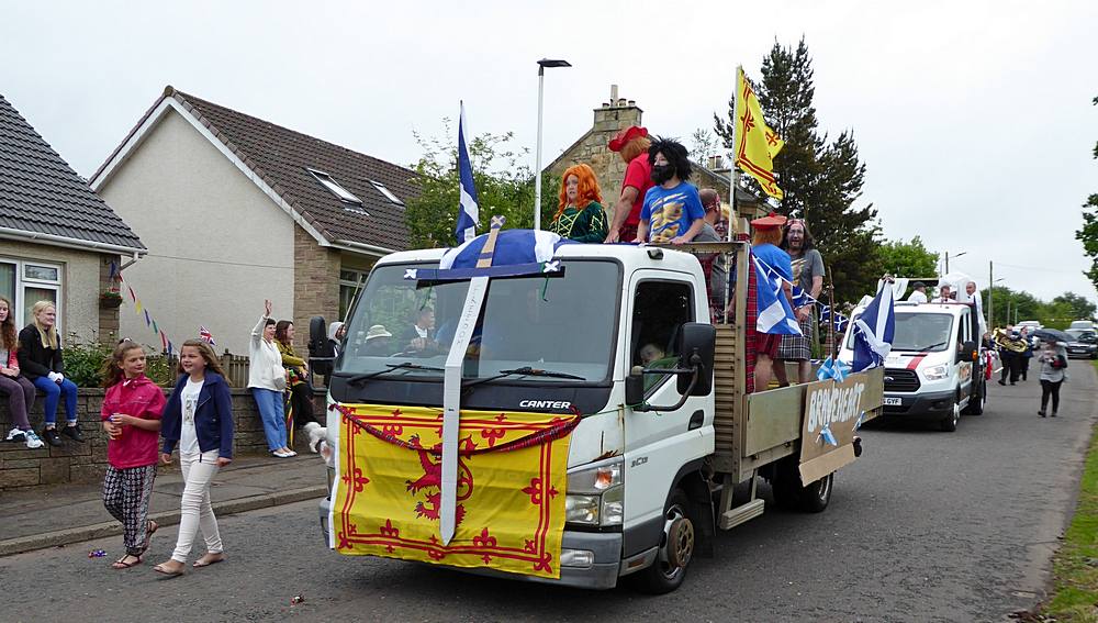 Braveheart warriors riding on a truck