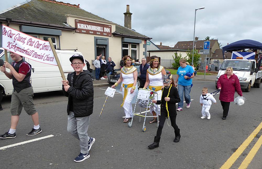 Kirkmuirhill Parish Church. The two ladies in white are Ancient Egyptians with their cat (in black)