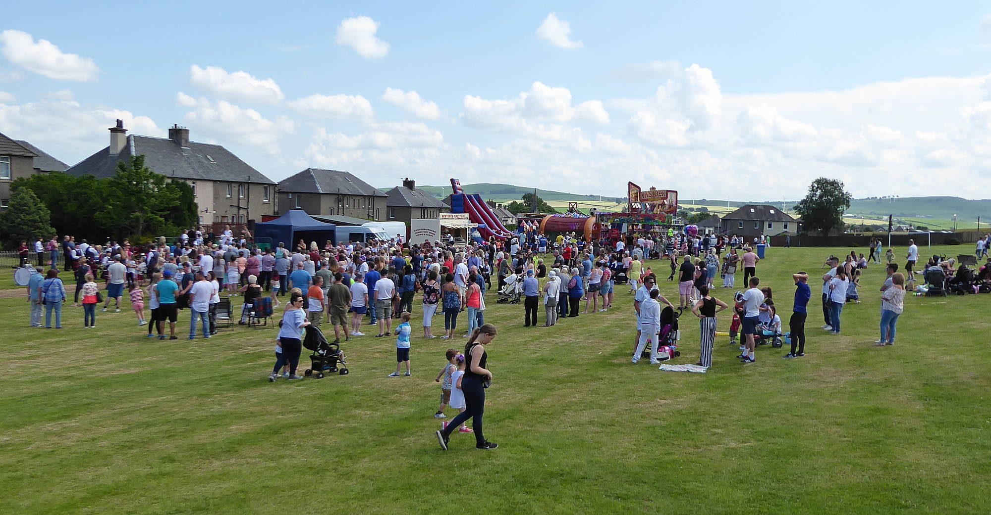 Lochanbank Park with amusements, refreshments and plenty of people.