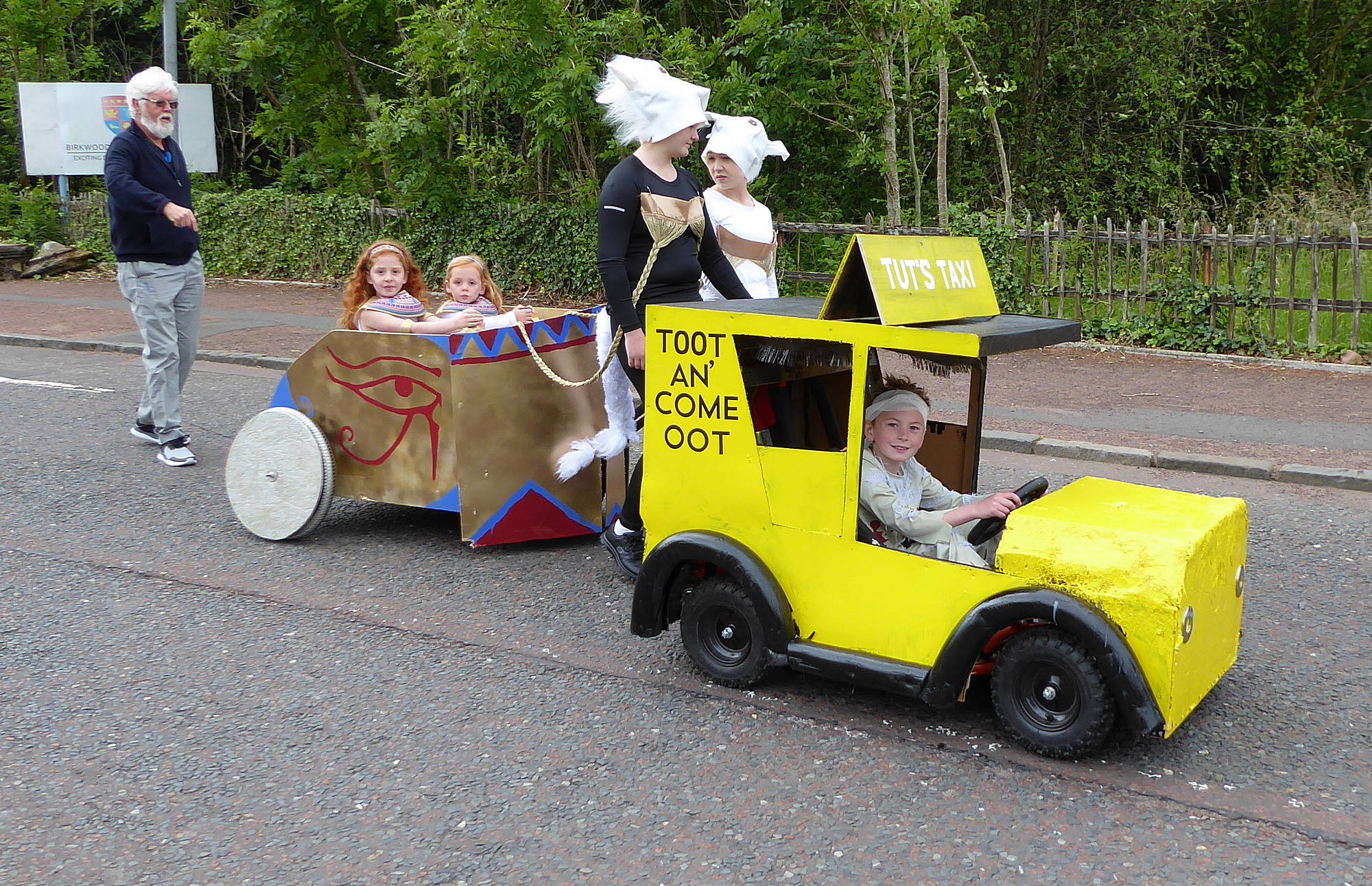 Tut's Taxi. Great logo on the side. and a great chariot behind.