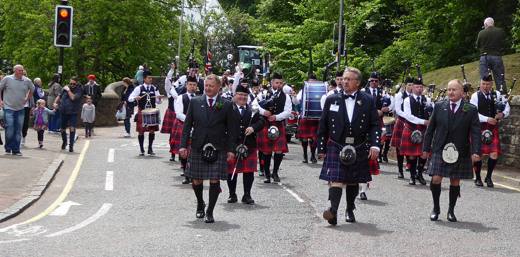 The procession crosses Turholm Bridge into Abbeygreen.