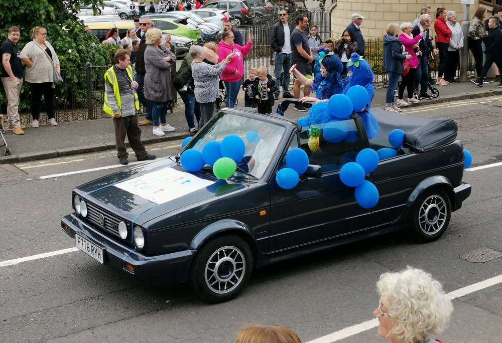 Car with balloons