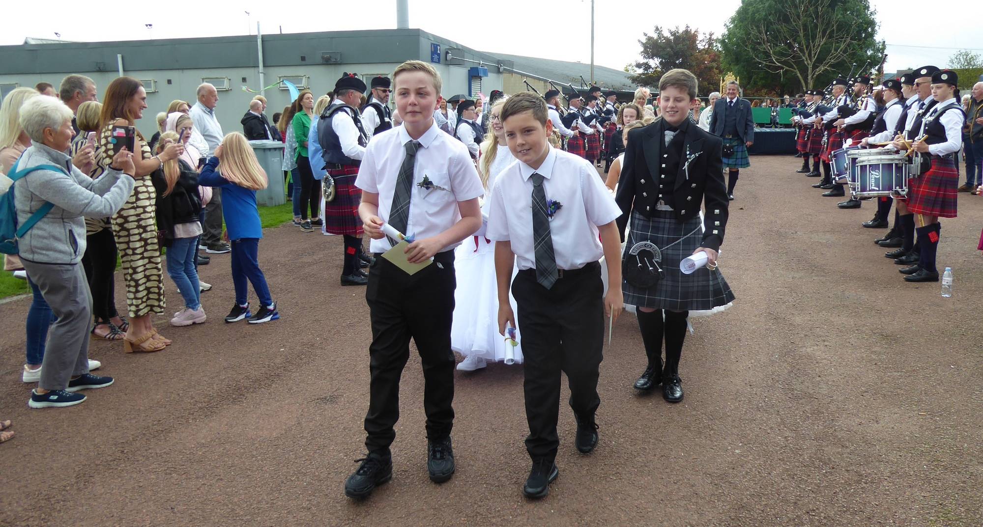 Car attendants Billy and Harley head the procession back to the cars