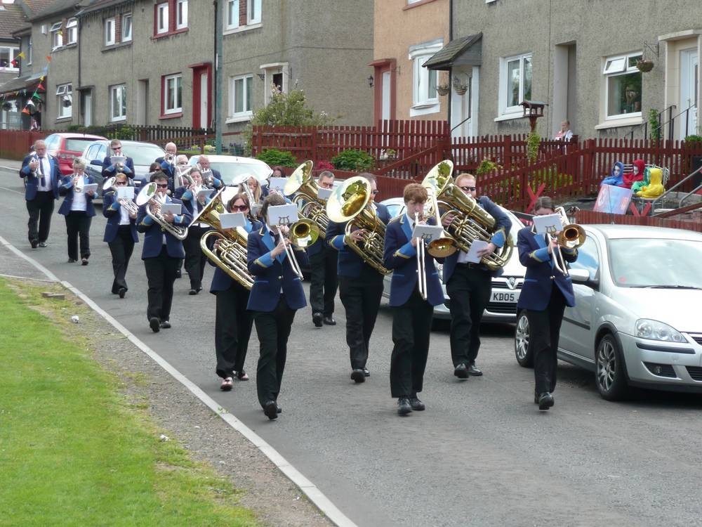 Coalburn Silver Band leading the procession back to Blackwood Hall from Lochanbank Park