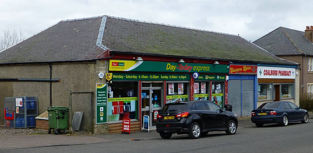 Shops in Coalburn Road (Convenience Store, Takeaway and Pharmacy). The building was originally built for the Coalburn District Co-operative Society in the 1890s