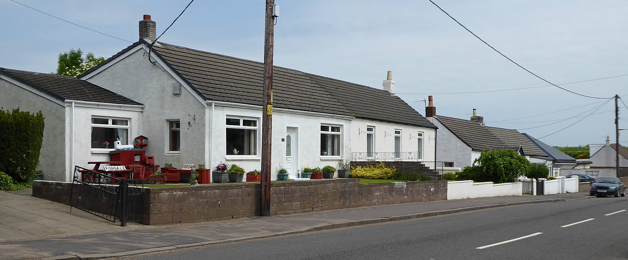 Cottages in Bellfield Road near bus terminus. 8th June 2018