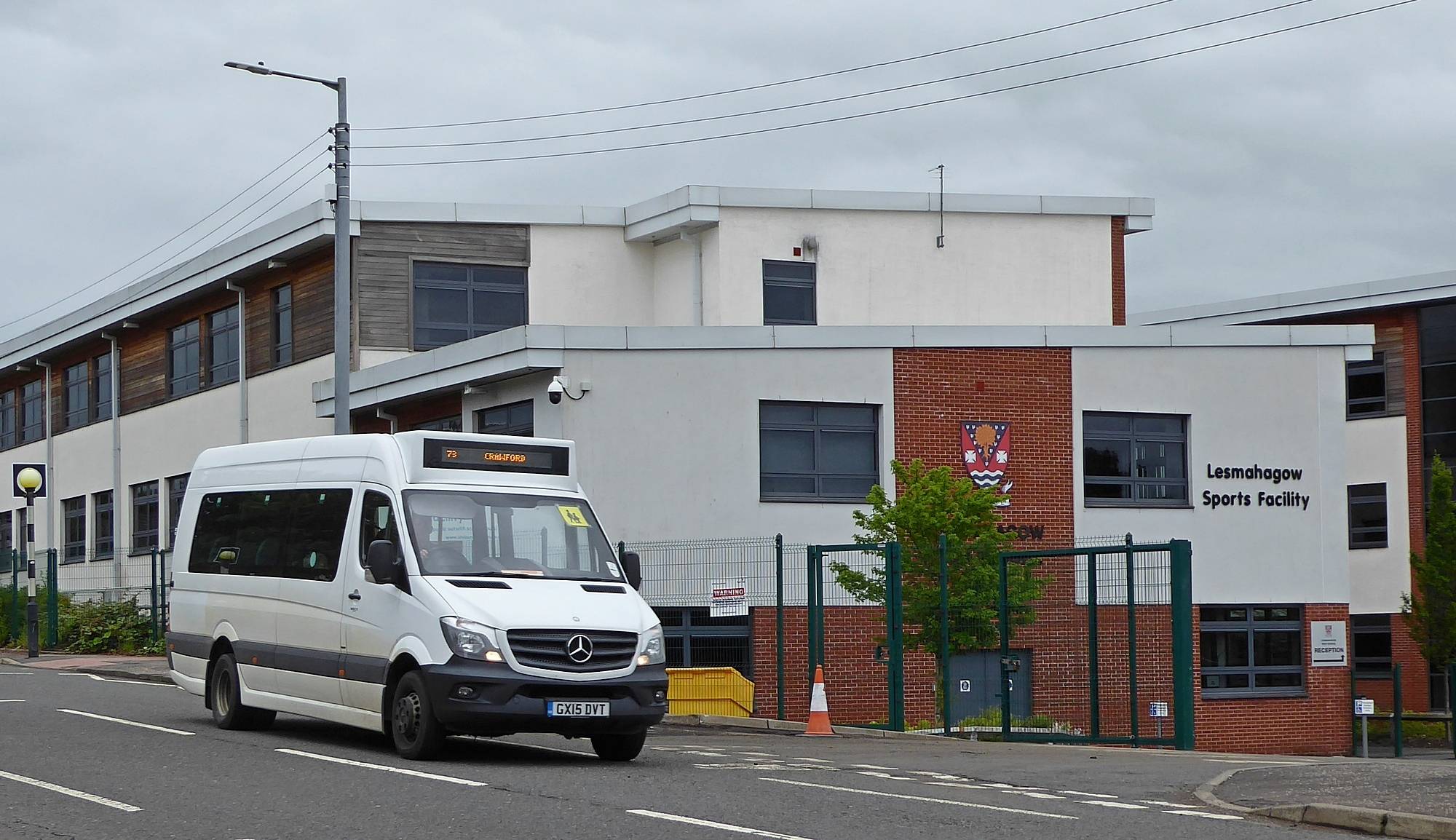 73 Crawford bus passing Lesmahagow High School