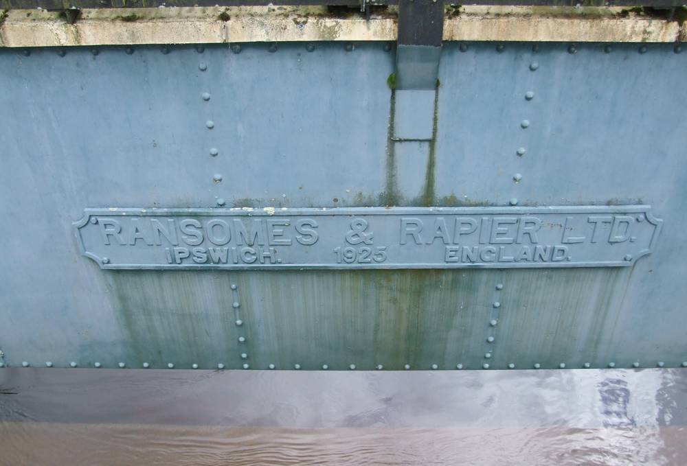 Plaque on weir gates at Stonebyres