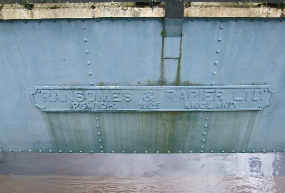 Plaque on weir gates at Stonebyres