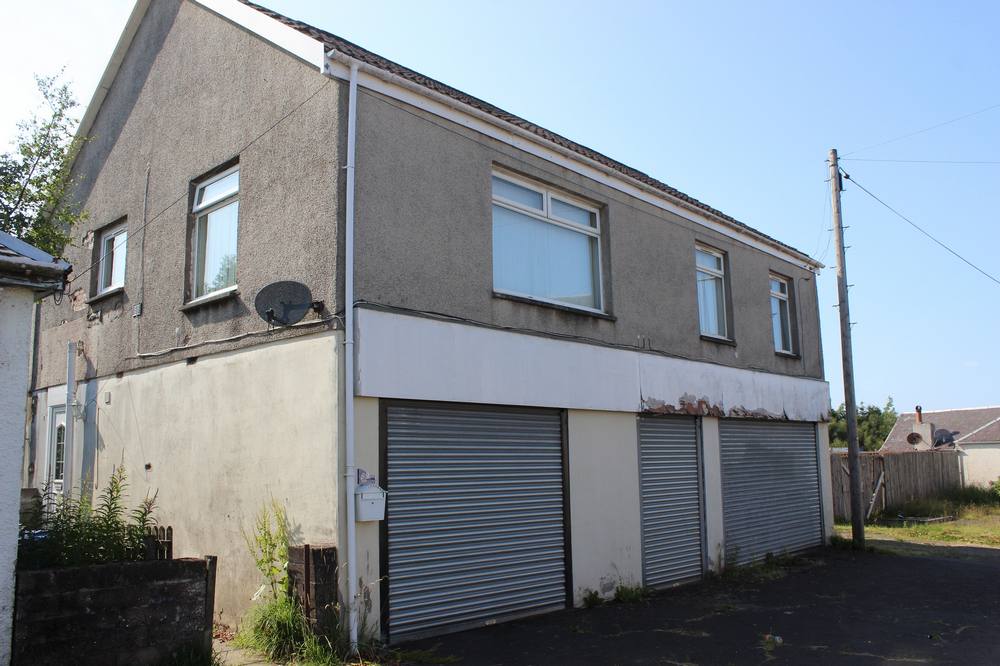 Row of shops opposite Miners Welfare Building (currently not in use)