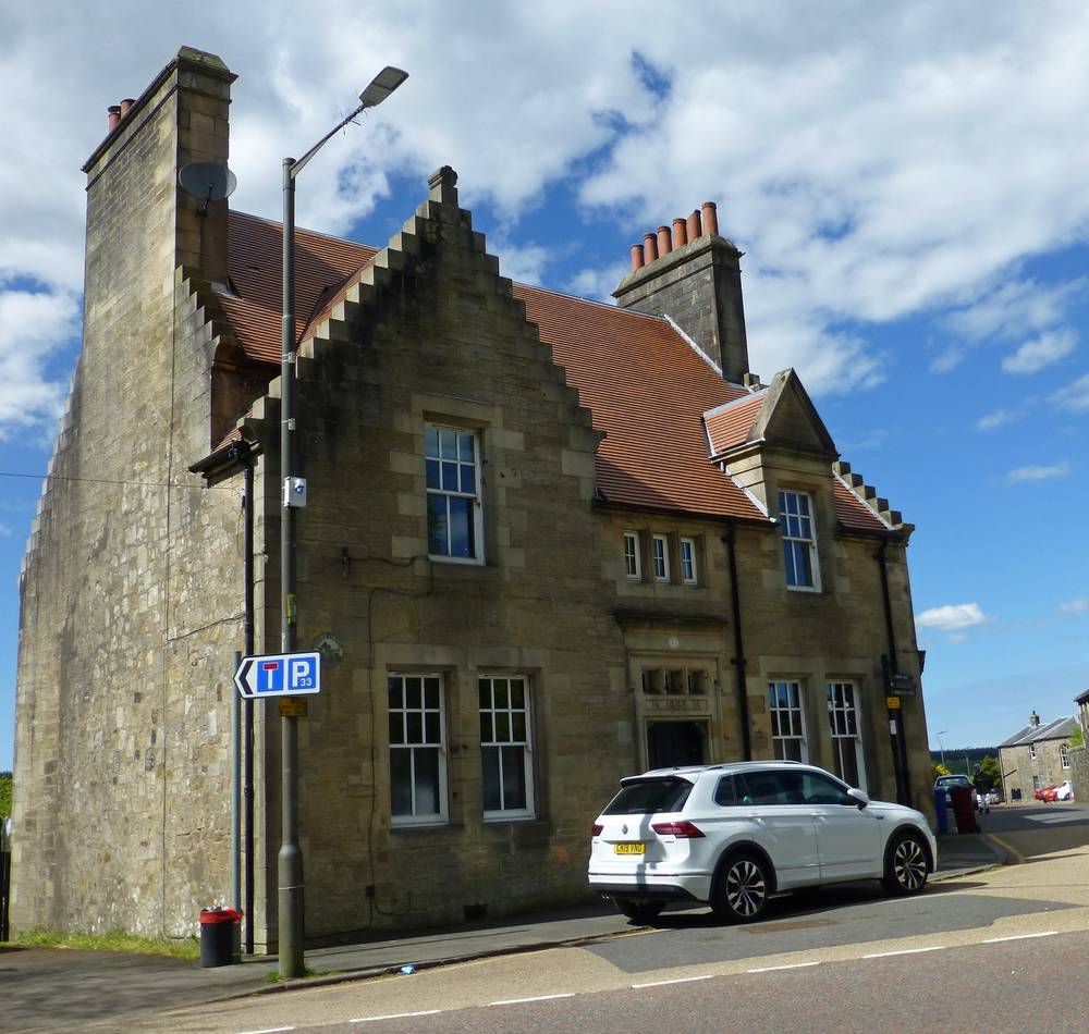 Douglas - A70 trunk road through village.