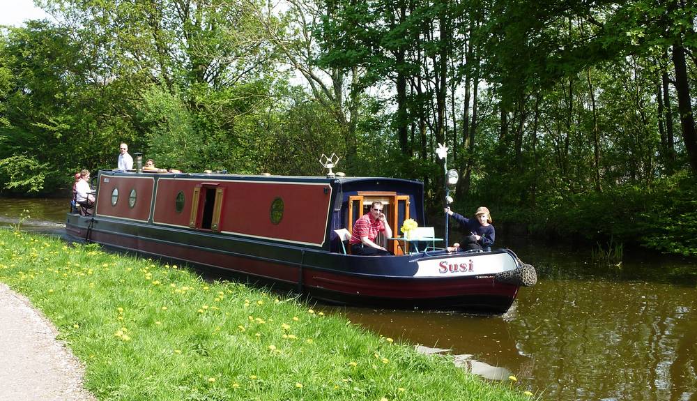 Narrow boat 'Susi' on the Lancaster Canal near the Lune Aqueduct