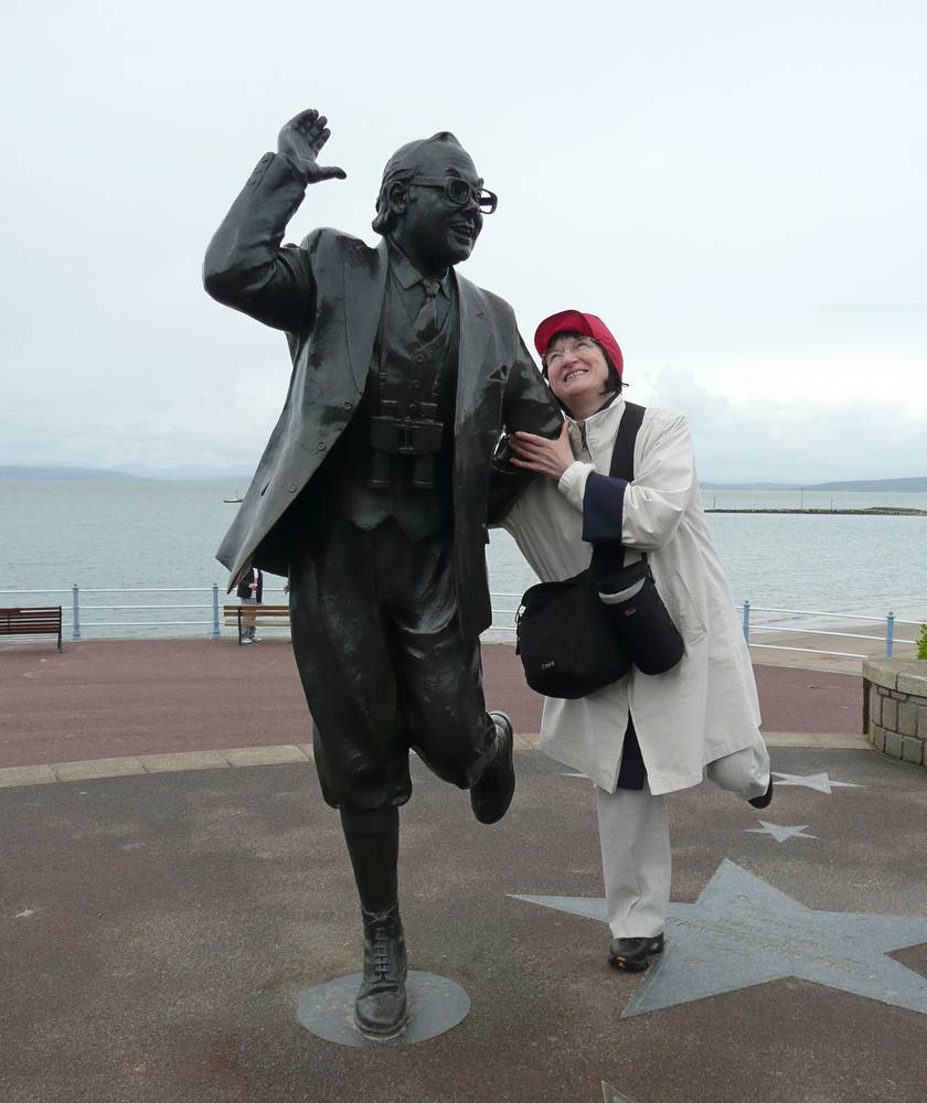 Statue of Eric Morecambe on the seafront (with Rozsa Halls)
